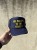 SHE BELONG TO THE STREETS - TRUCKER HAT